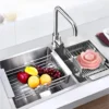 cb07387c96e867dd64bee50c5cba9555.webp Expandable Over-Sink Dish Drying Rack | Stainless Steel Basket & Drainer Tray | Adjustable Arms