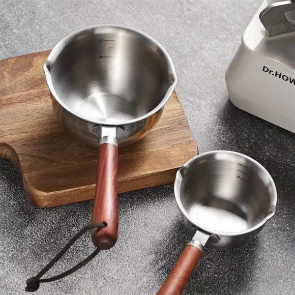 sg-11134201-7rdwy-m0lgk7c6jtac7b.webp Stainless Steel Mini Oil Pan with Wooden Handle | 150ml / 300ml Small Milk & Hot Oil Pot
